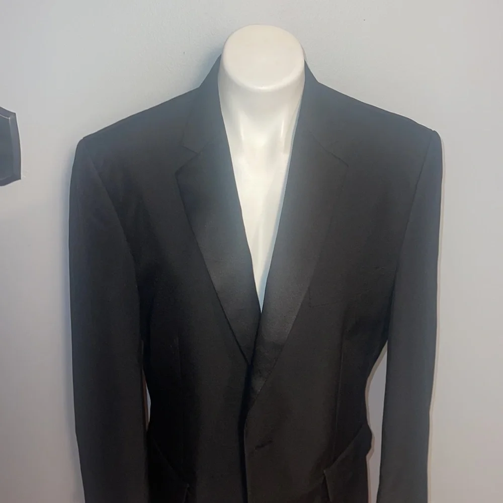 Formal Fashions men’s black tuxedo jacket and pants. Jacket 38S, Pants 34x34